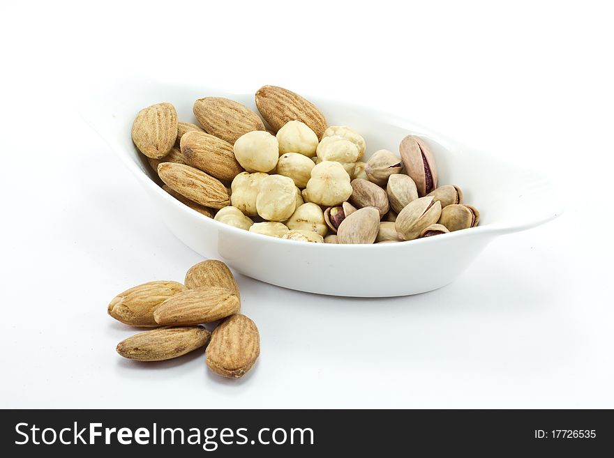 Various nuts; hazelnuts and almond and pistachio