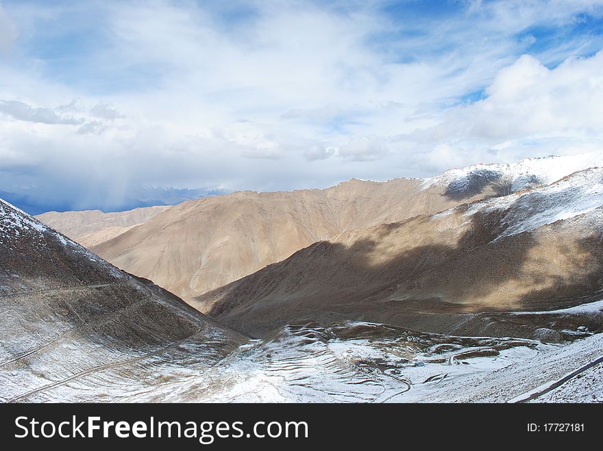 A beautiful landscape scene with white and bright snow and mountains. A beautiful landscape scene with white and bright snow and mountains.