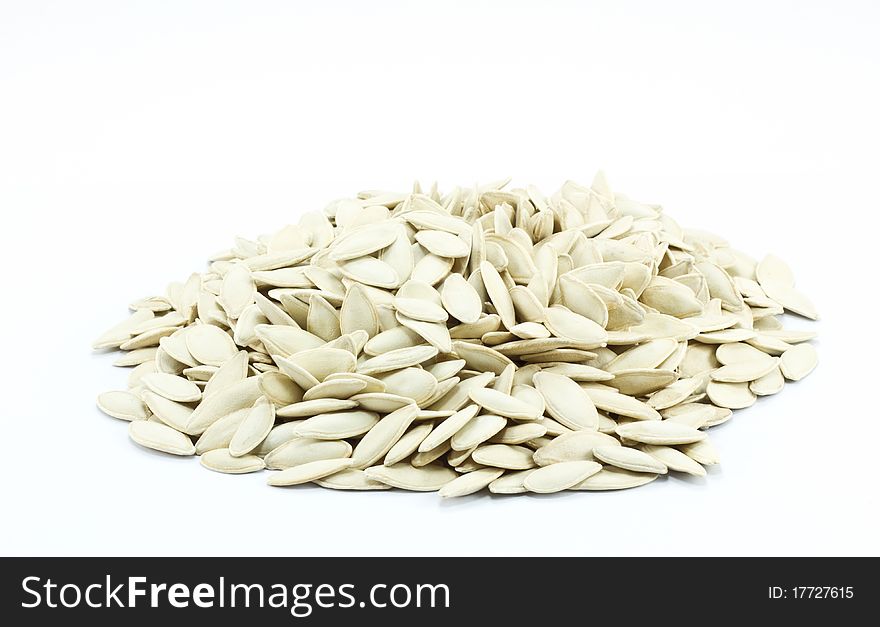 Roasted pumpkin seed isolated on white