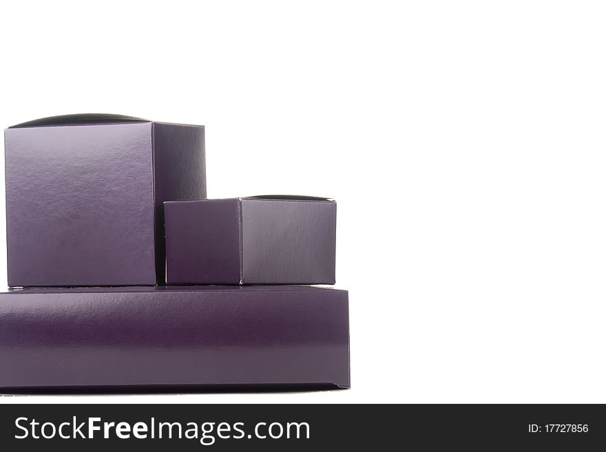 Gift box of darkly violet colour on a white background.