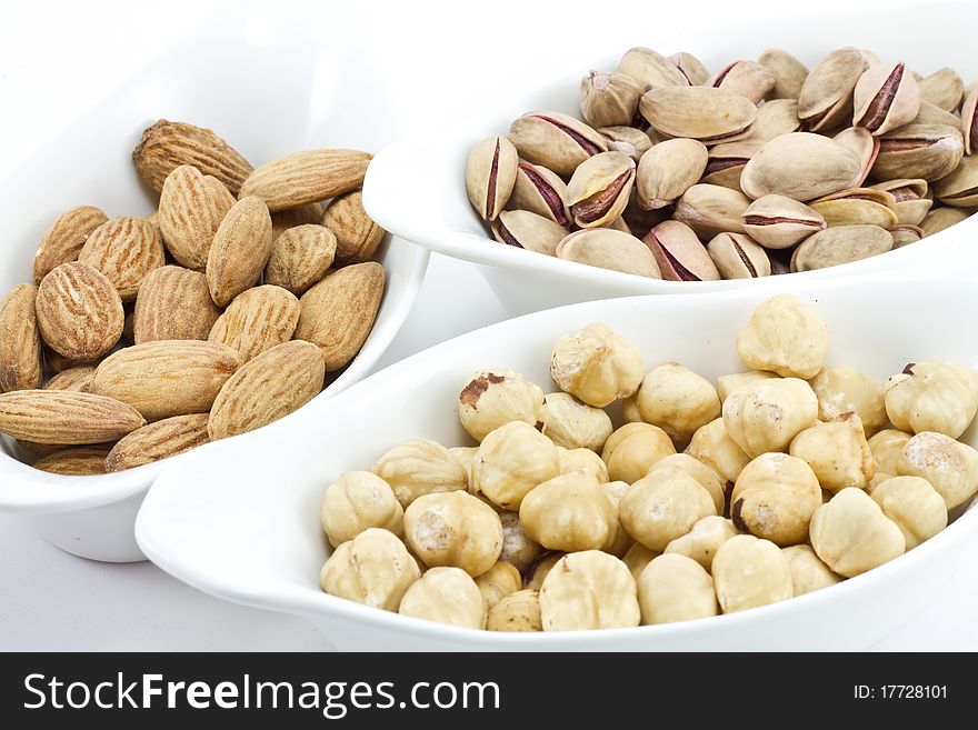 Various nuts; hazelnuts and almonds and pistachio