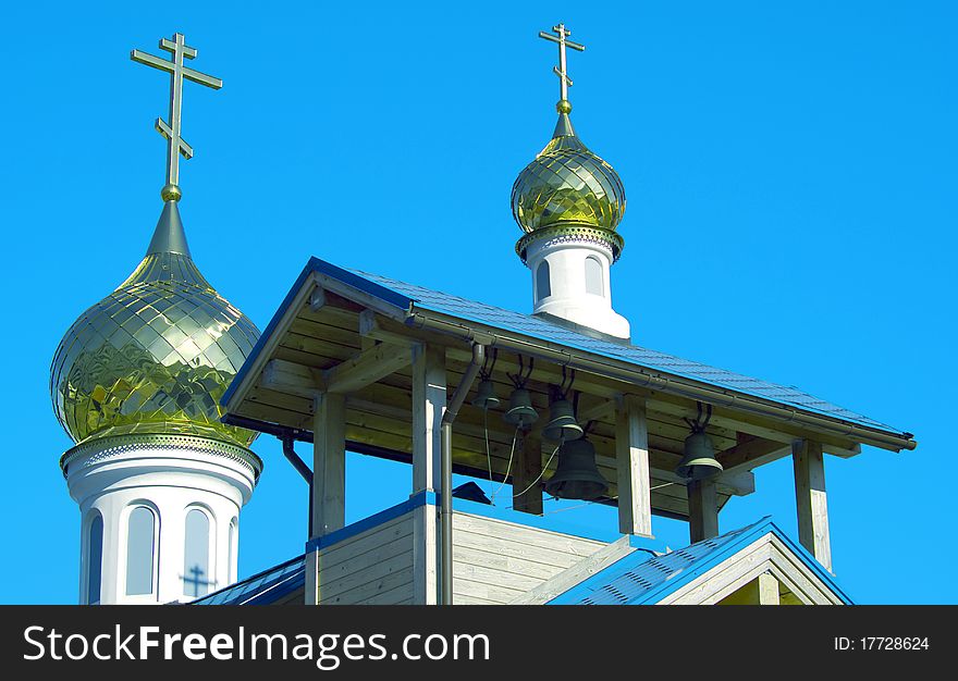 Domes of orthodox church against the dark blue sky