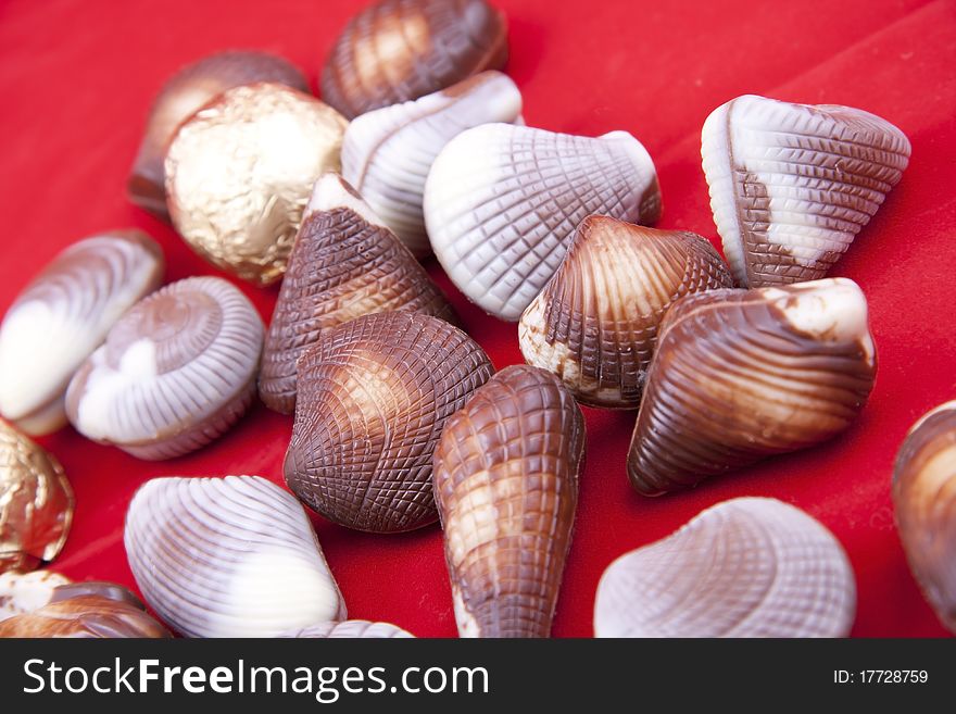 Chocolate sweets in shape of little shells