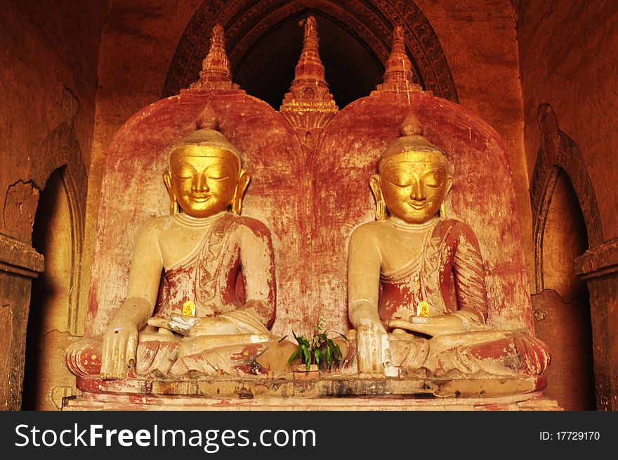 Twin Golden Buddha statue in temple of Bagan Myanmar. Twin Golden Buddha statue in temple of Bagan Myanmar