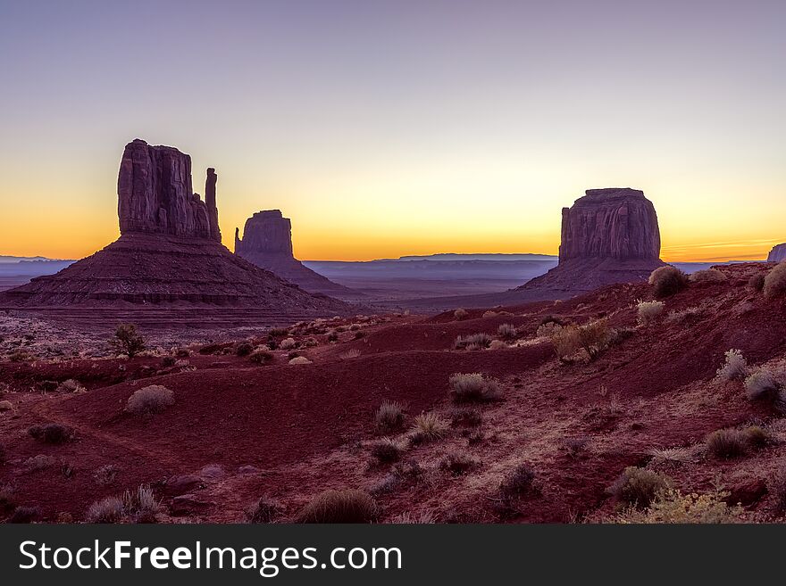 Beautiful Colorful Sunrise View Of Famous Buttes Of Monument Valley On The Border Between Arizona And Utah