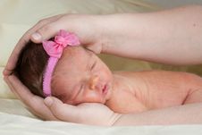 Cute Baby With A Pink Bow Royalty Free Stock Image