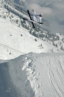 Young Freestyle Skier Jumping High Stock Images