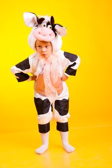 Little Girl In The Suit Of Cow Stock Photography