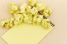 Notebook And Crumpled Paper Royalty Free Stock Photography