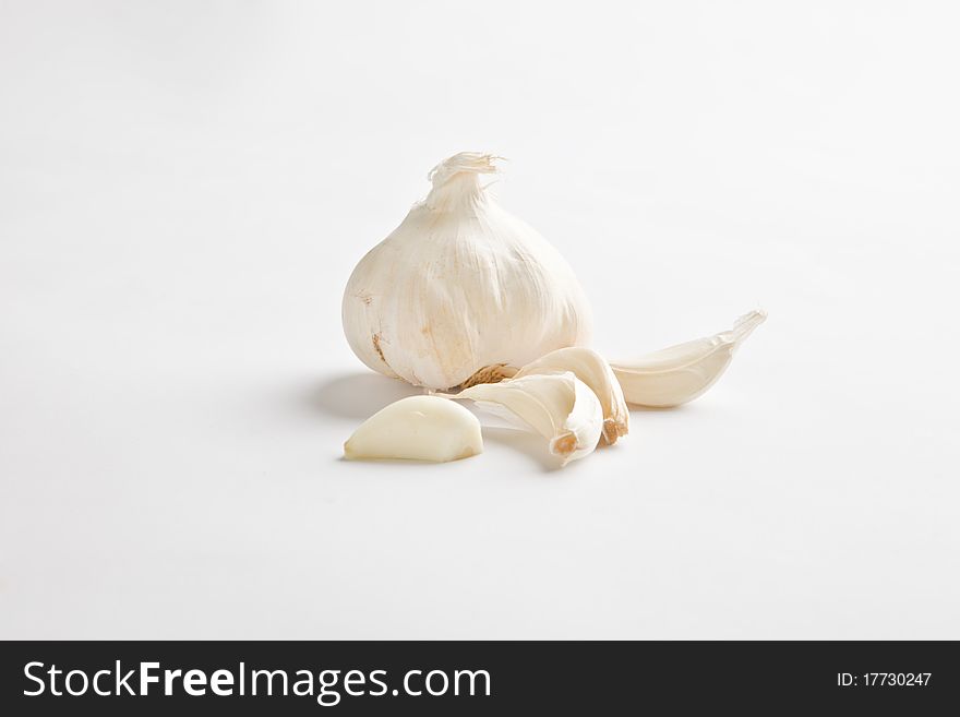 Photo of garlic on white background