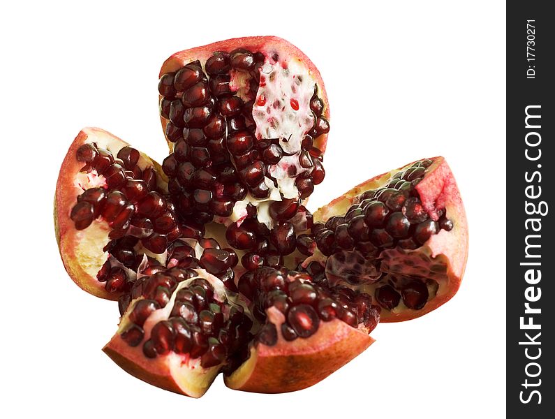 Fruit, sliced pomegranate, isolated on a white background