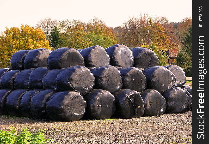 Wrapped black plastic straws bale. Wrapped black plastic straws bale