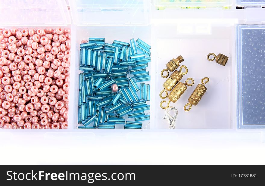 Colourful beads in a box. Close up