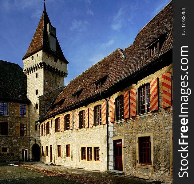 This Swiss fortress, today housing a military school and a military museum, is located in the Swiss town of Colombier on Lake Neuchatel.