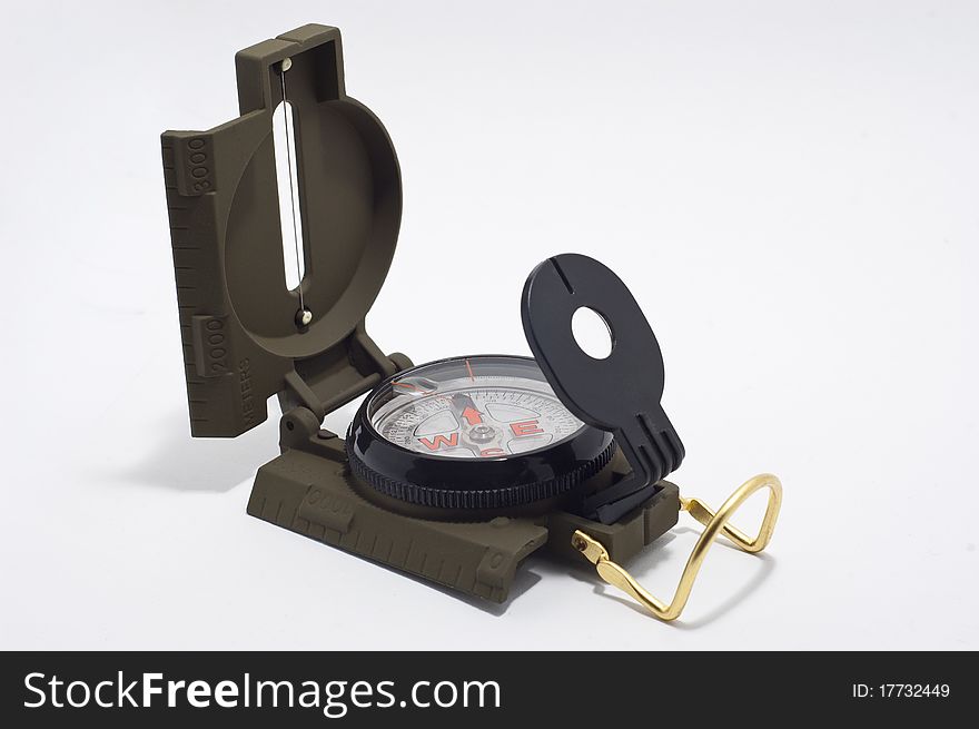 A compass sitting in a light box.