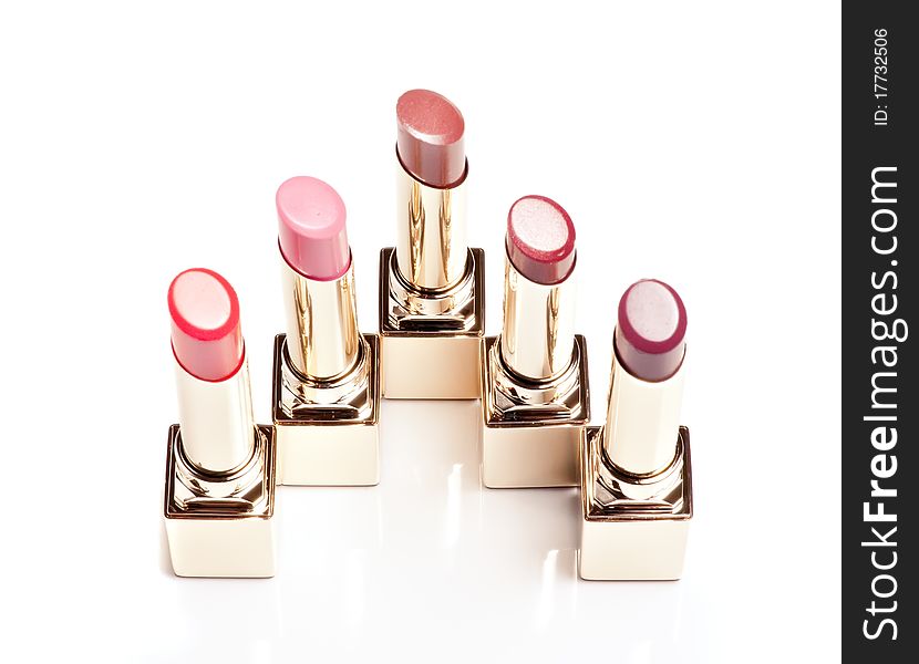 Group of lipsticks on a white background