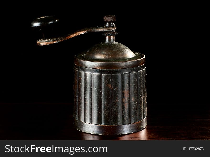 Vintage coffee grinder. Studio shot.