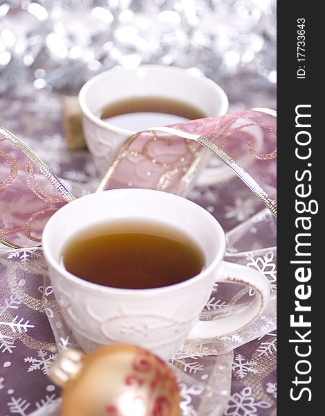 Winter tea on silver background