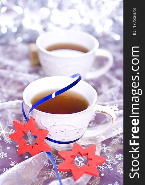 Winter tea on silver background