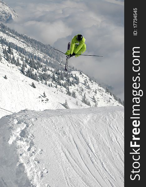 Young freestyle skier jumping high