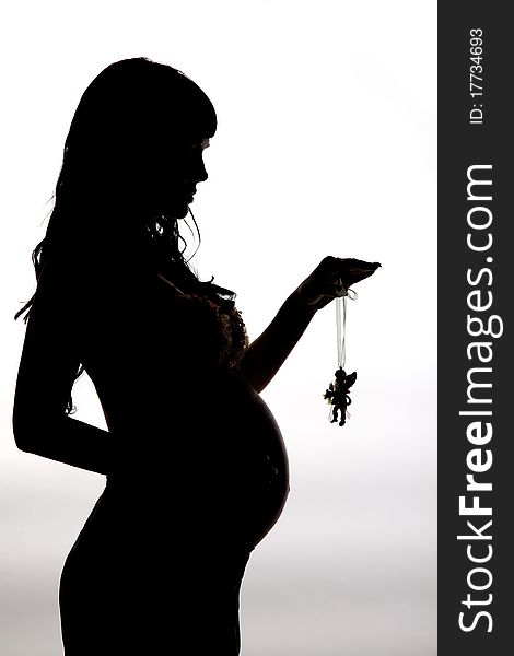 Silhouette a beautiful pregnant woman