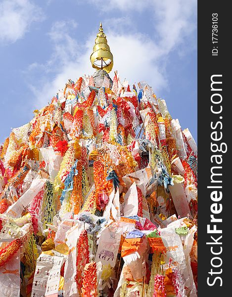 The tradition of flag colors. He is on a pile of sand to the pagoda. Northern Thailand