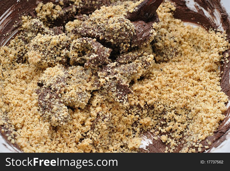 Baking chocolate cake with nuts- process of cooking