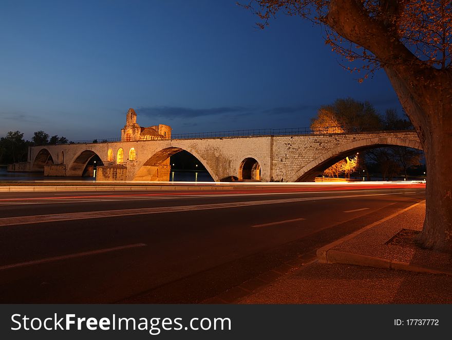 Night view of the Pont St. Benezet (AKA Pont d'Avignon) famous bridge in the town of Avignon, France