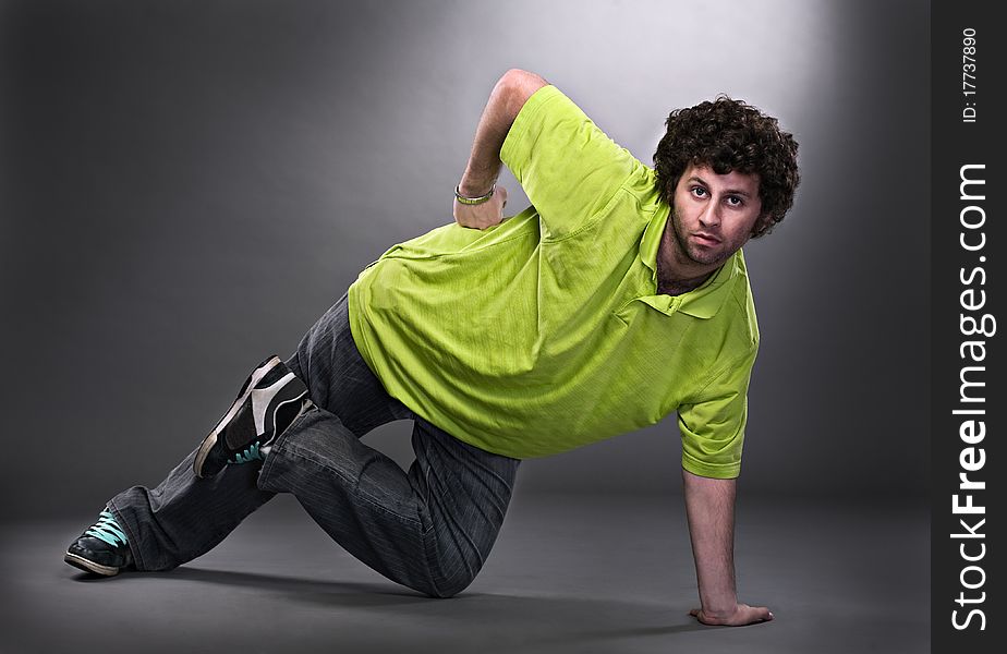 Cool dancer man on gray background