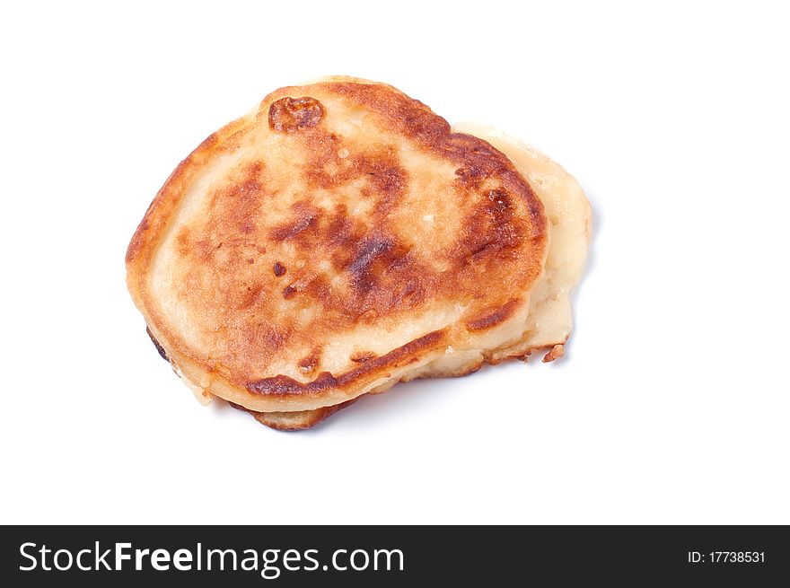 Cooking pancakes on a white background.
