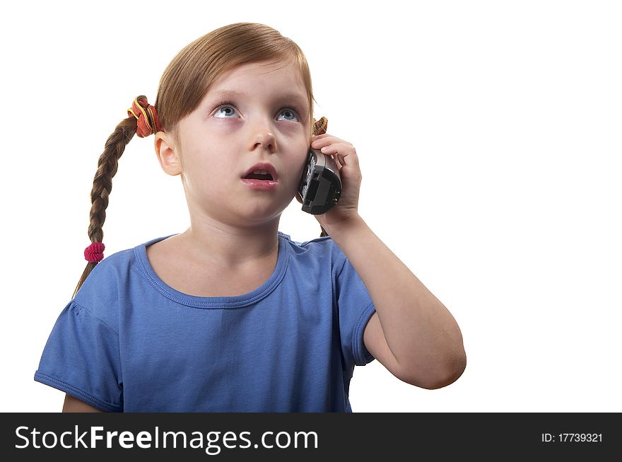 Funny smiling little girl takling by phone portrait isolated over white background. Funny smiling little girl takling by phone portrait isolated over white background