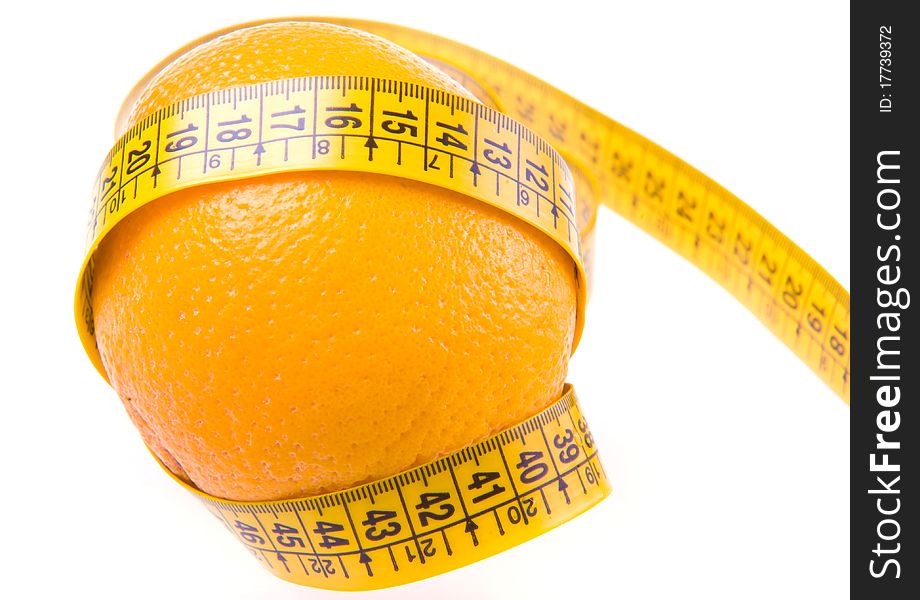 Orange and ruler. Healthy lifestyle. Weight loss. Vitamins. Fruit. Orange and ruler. Healthy lifestyle. Weight loss. Vitamins. Fruit