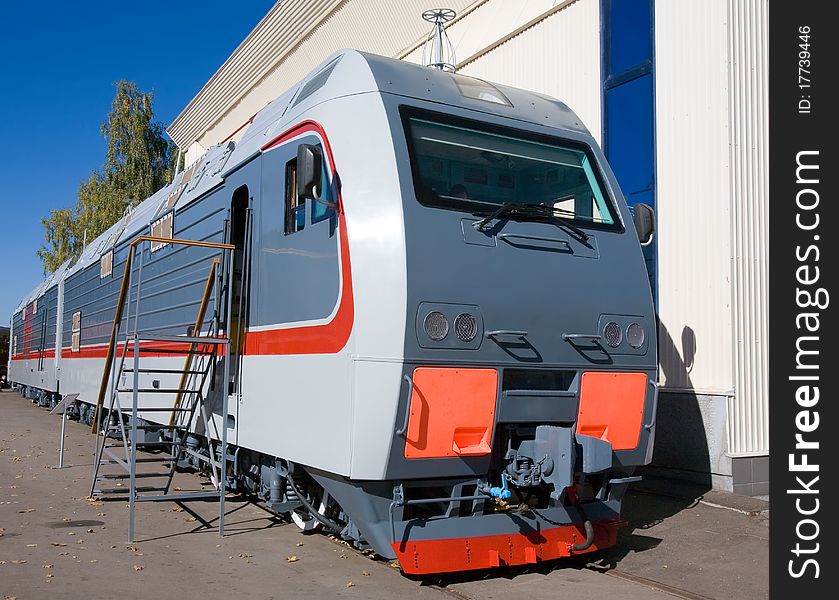 Russia. Grey passenger locomotive in depo