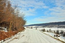 Snowy Road Near Frozen Forest Royalty Free Stock Photography