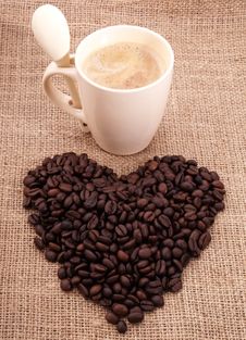 Coffee Beans With Cup On Canvas Stock Photography Coffee Beans With Cup On Canvas Stock Photography