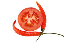 Sliced Tomato And Two Chili Peppers Royalty Free Stock Image Sliced Tomato And Two Chili Peppers Royalty Free Stock Image