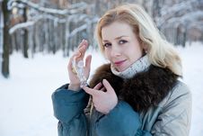 A Woman With A Figure Of A Crystal Angel Royalty Free Stock Photography A Woman With A Figure Of A Crystal Angel Royalty Free Stock Photography