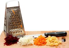 Grated Fresh Fruits, Grater And A Knife Royalty Free Stock Images Grated Fresh Fruits, Grater And A Knife Royalty Free Stock Images