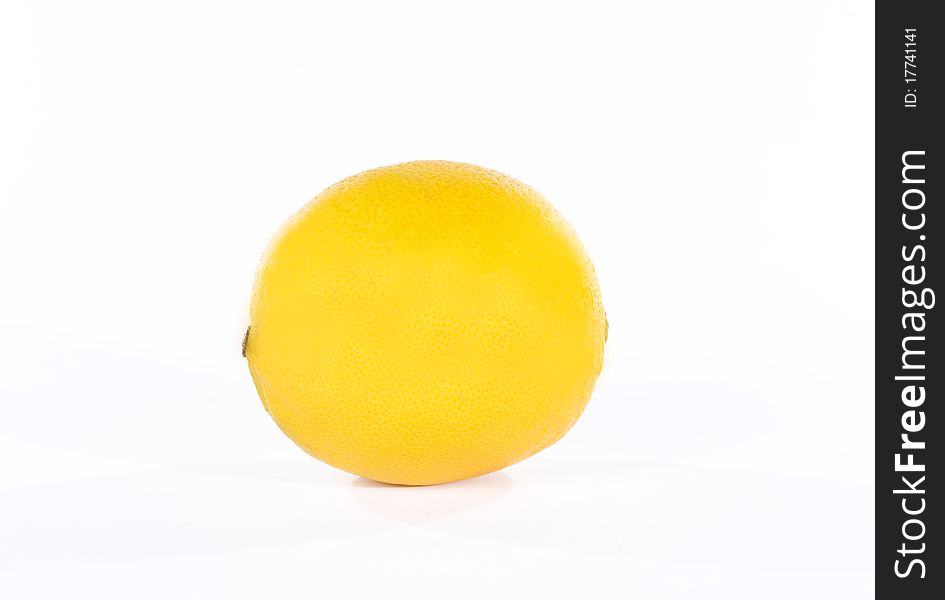 Yellow lemon over white background. Studio shot.
