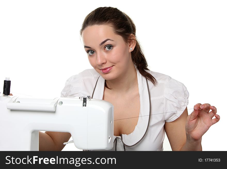 Woman seamstress work on the sewing-machine