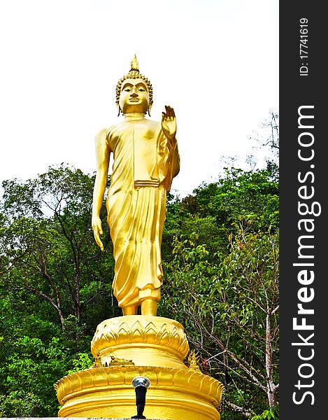 Walking Buddha statue at southern of thailand.