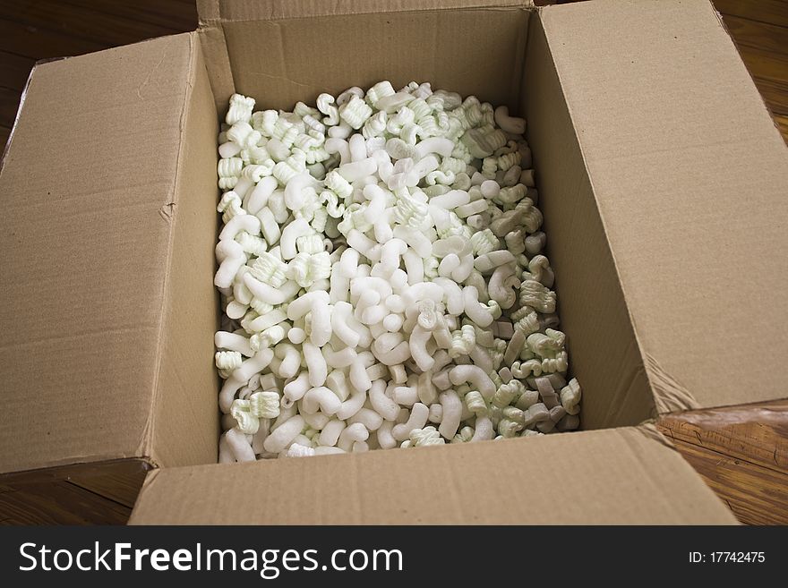 Open Mailing carton with packing peanuts. Open Mailing carton with packing peanuts.