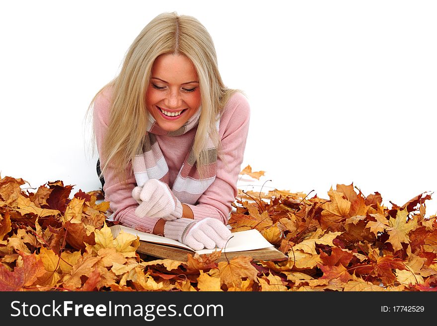 Autumn woman read in studio on leaves