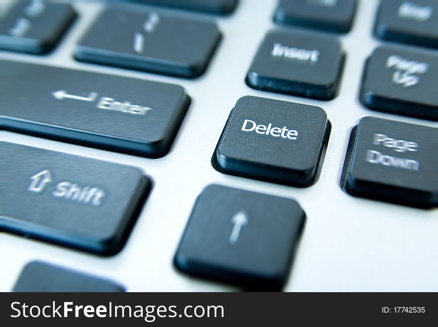 Black delete button keyboard in white letters