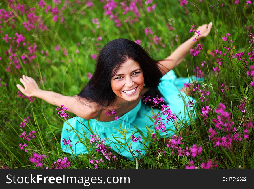 Woman on pink flower field