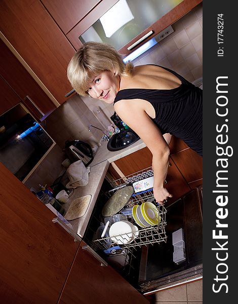 Young Woman On Kitchen