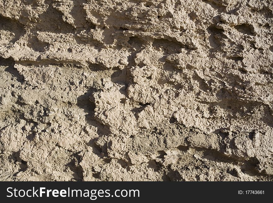 Close-up of the dried up surface of clay