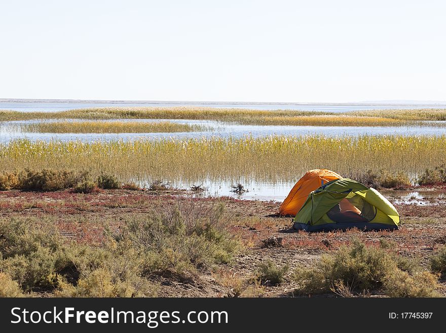 Campsite with Tent at the lake.