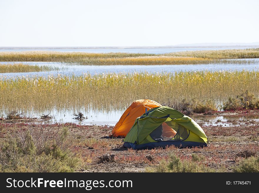 Campsite with Tent at the lake.