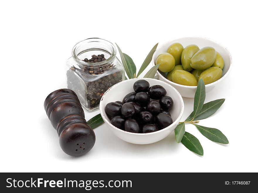 Olives, garlic, salt and bread isolated over white